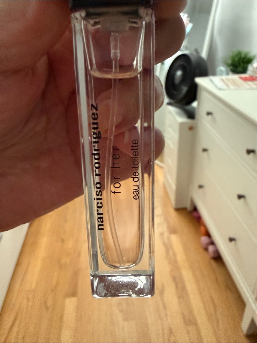 Narciso Rodriguez mini perfume bottle with light pink fluid